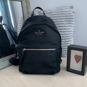 Kate spade backpack black plenty of room barely used slight wear strap
